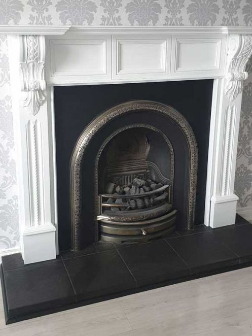 Fire place after being painted white