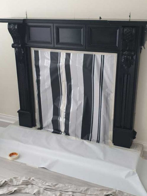 Fire place before being painted white